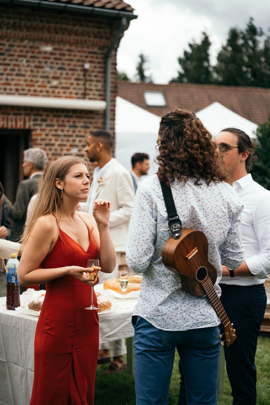 Thomas with his ukulele at a drinks reception